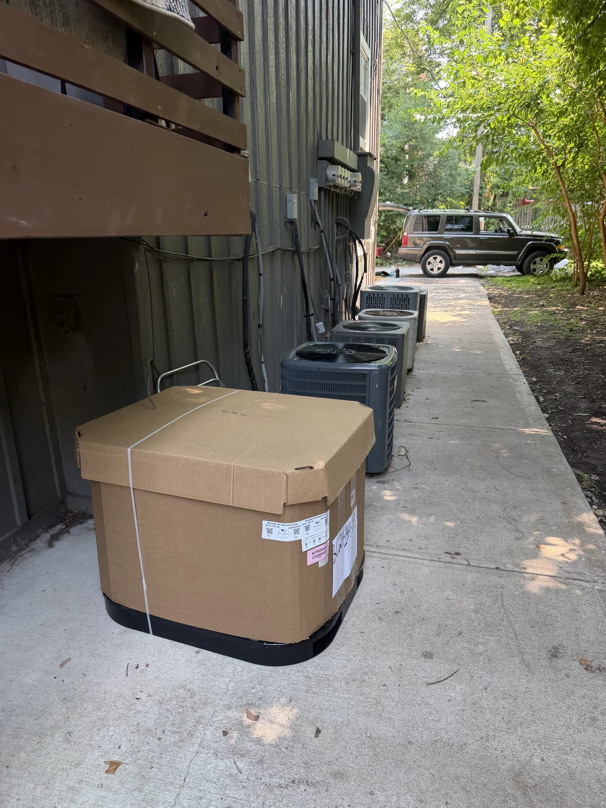 Air conditioning equipment beside a residential property