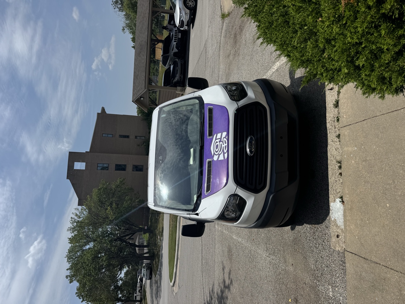 Rose Legacy service van front with branded hood logo